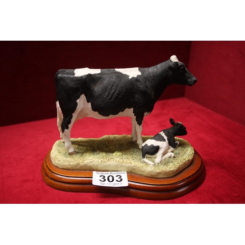 303 - COW & CALF ORNAMENT