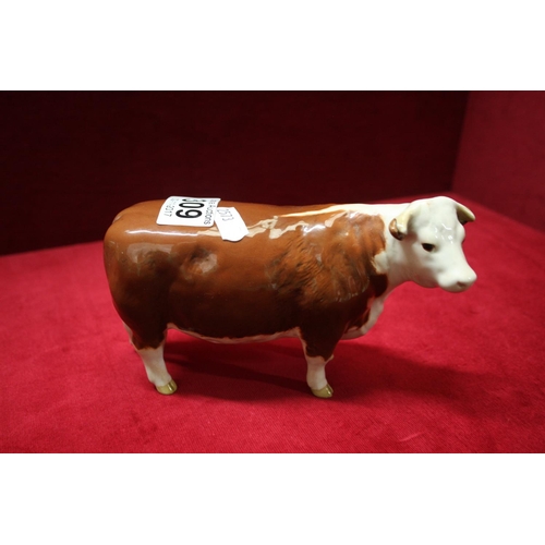 309 - BESWICK HEREFORD COW ORNAMENT