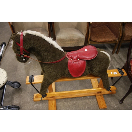 302 - ROCKING HORSE ON PINE STAND