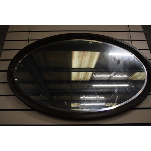 456 - MAHOGANY OVAL FRAMED MIRROR