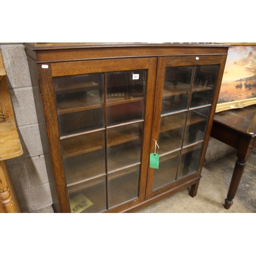 487 - GLASS FRONTED BOOKCASE