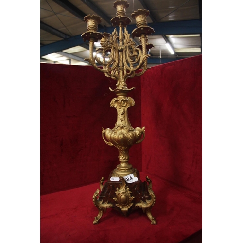 384 - GILT CANDLEABRE ON ONYX STAND