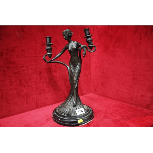 324 - BRONZE FIGURINE CANDLE HOLDER