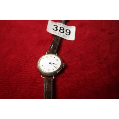 389 - LADIES 9CT GOLD RED TWELVE WATCH