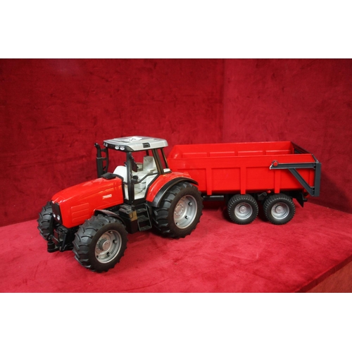 131 - MASSEY FERGUSON TOY TRACTOR & TRAILER