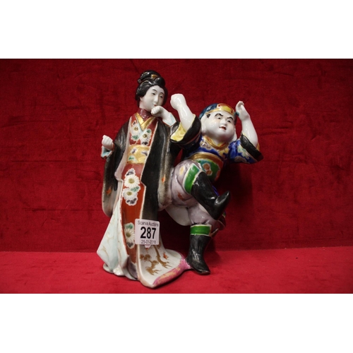 287 - 19TH CENTURY TANAKA GROUP FIGURE