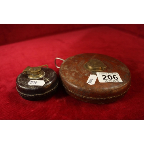 206 - 2 LEATHER BOUND TAPE MEASURES