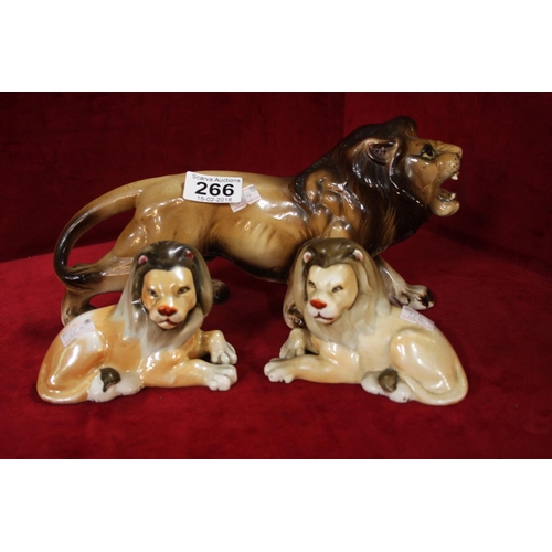 266 - ANTIQUE PORCELAIN LION FIGURES