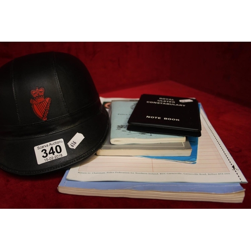 340 - SELECTION OF RUC BOOKS PLUS MOTORBIKE HELMET