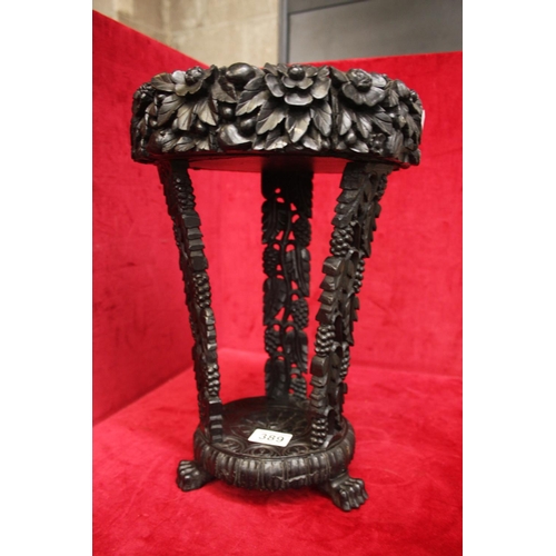 389 - ANTIQUE CARVED IRISH BOG OAK STAND