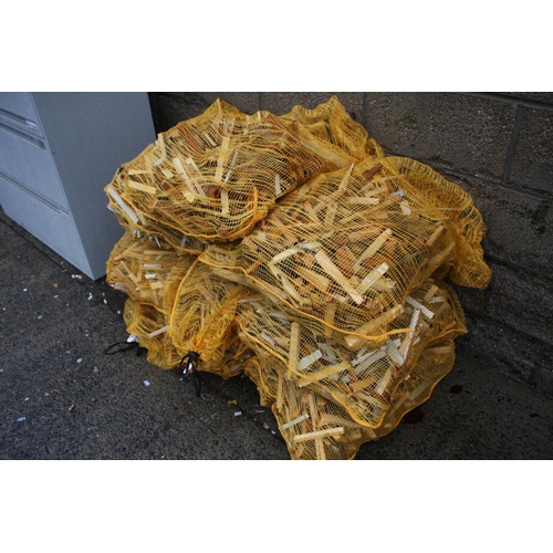 86 - 10 YELLOW NET BAGS OF FIRELIGHTERS