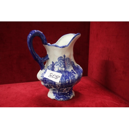 808 - BLUE & WHITE CERAMIC JUG