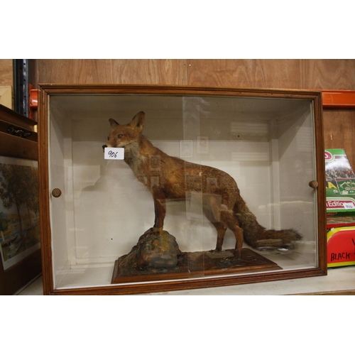 906 - STUFFED FOX IN CABINET