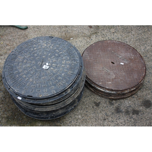 55 - LOT OF MANHOLE COVERS