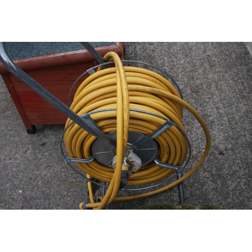 85 - LARGE HOSE & REEL