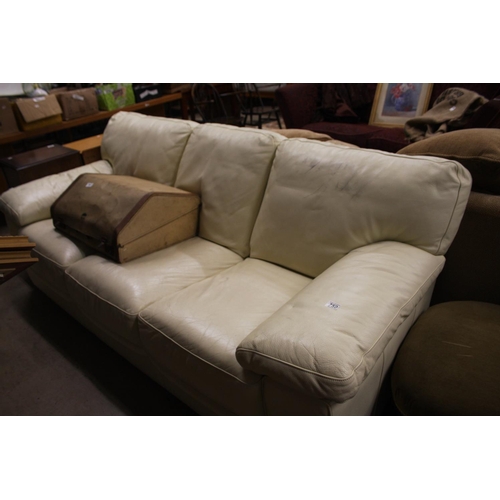 759 - CREAM LEATHER 3 SEATER SETTEE