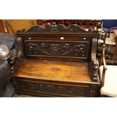 775 - OAK CARVED MONKS BENCH