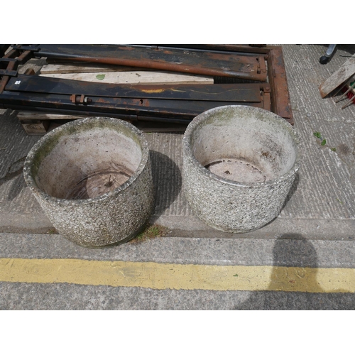 18 - PAIR OF CONCRETE PLANTERS