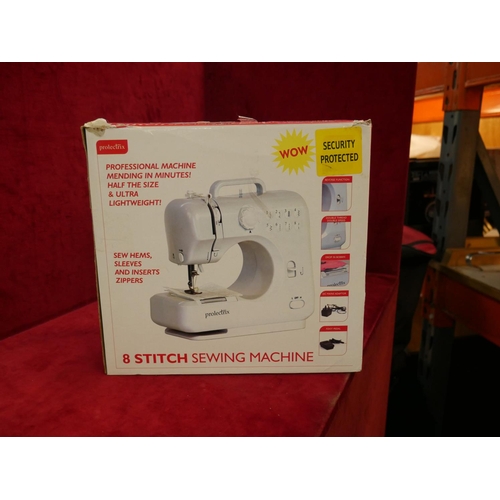 846 - BOXED SEWING MACHINE