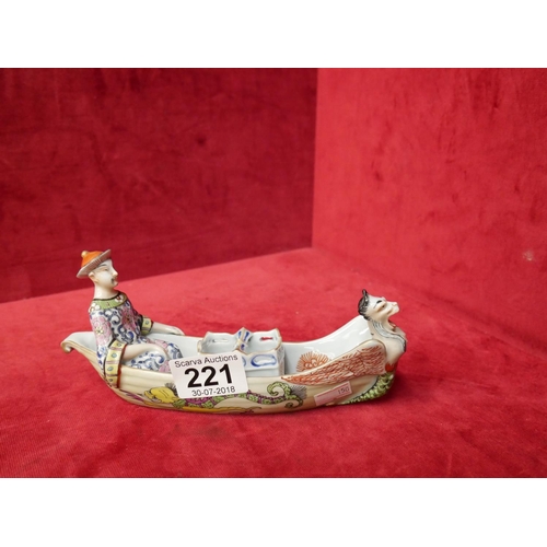 221 - ANTIQUE CHINESE PORCELAIN MAN IN BOAT FIGURE