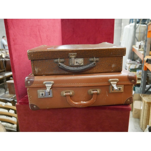 712 - 2 LEATHER SUITCASES