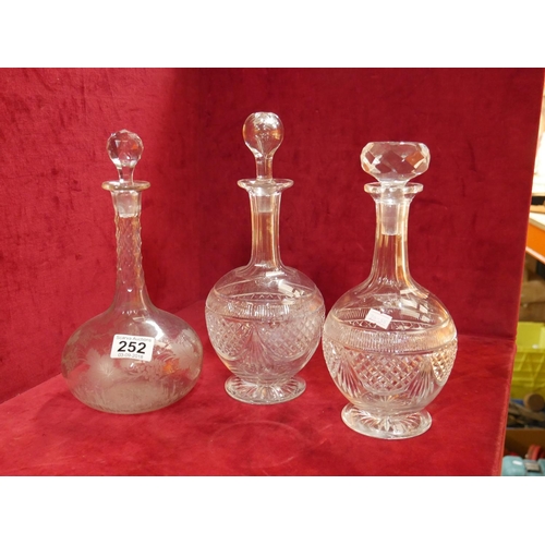 252 - 3 CRYSTAL DECANTERS