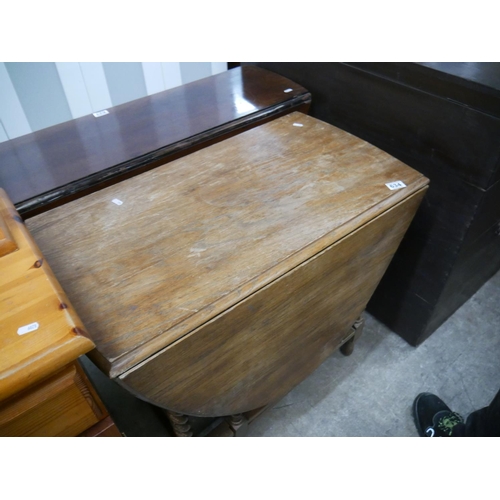 634 - OAK DROP LEAF TABLE