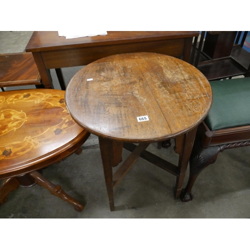 665 - OAK CIRCULAR TABLE