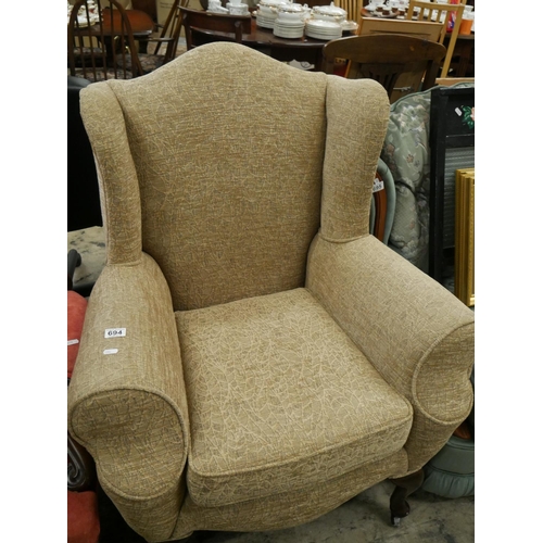 694 - FABRIC WING BACK ARMCHAIR