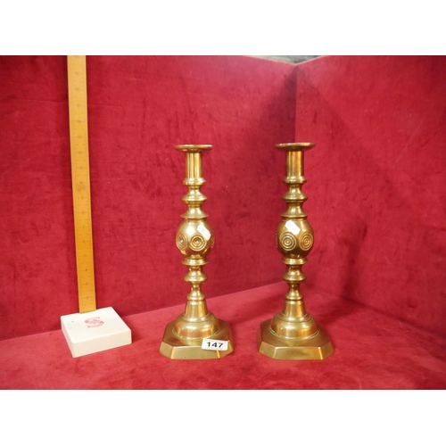 147 - PAIR OF BRASS CANDLESTICKS