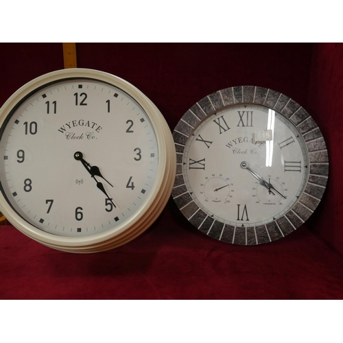 615 - 2 WALL CLOCKS