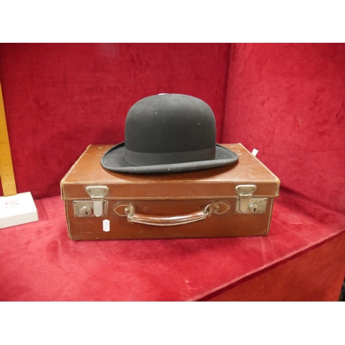 860 - BOWLER HAT & BRIEFCASE