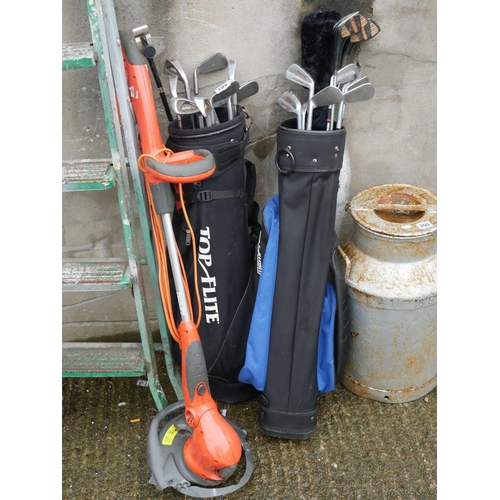 199 - 2 BAGS OF GOLF CLUBS & ELECTRIC STRIMMER