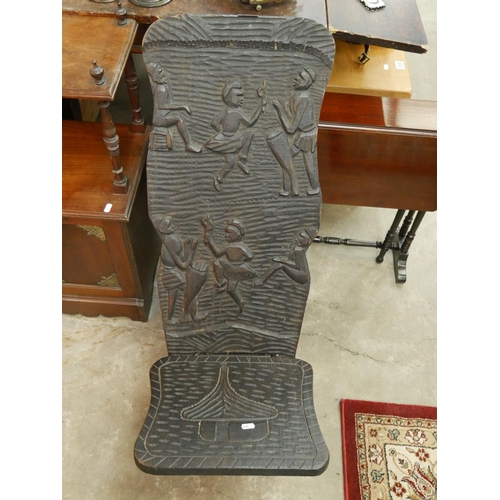 315 - CARVED TRIBAL CHAIR