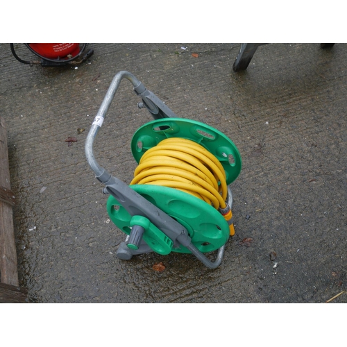 87 - GARDEN HOSE & REEL