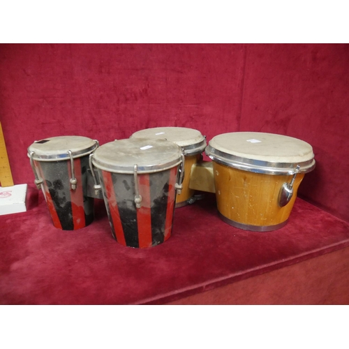 101 - 4 SMALL BONGO DRUMS