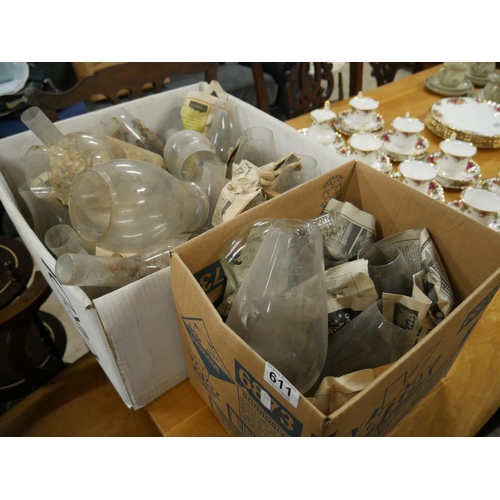 611 - 2 BOXES OF GLASS LAMP CHIMNEYS ETC