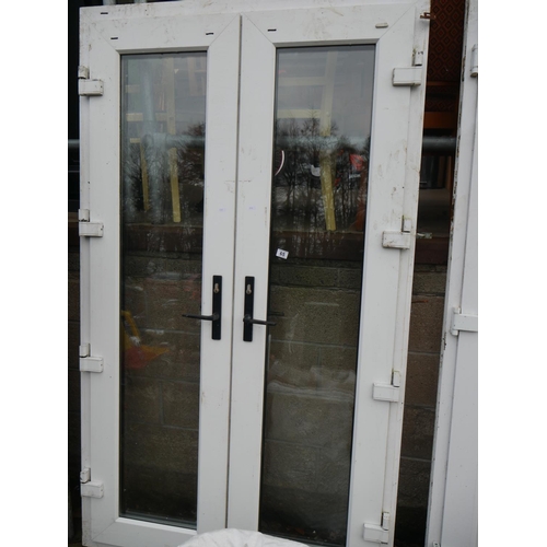 65 - DOUBLE PVC DOOR & FRAME