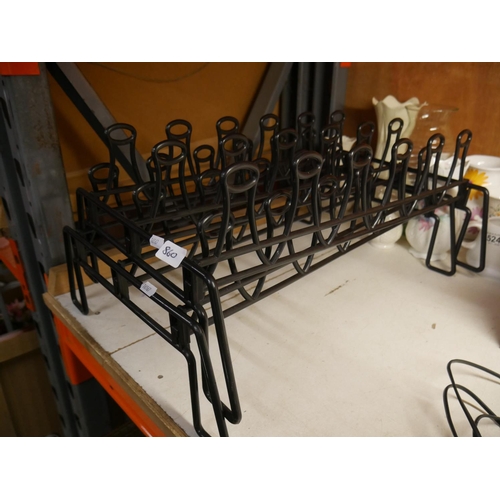 860 - 2 PLASTIC SHOE RACKS