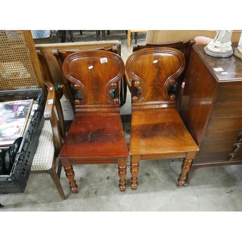 590 - PAIR OF GEORGIAN MAHOGANY HALL CHAIRS