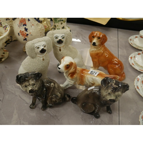 621 - 7 POTTERY DOGS