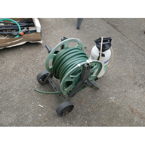 79 - GARDEN HOSE & REEL PLUS SPRAYER