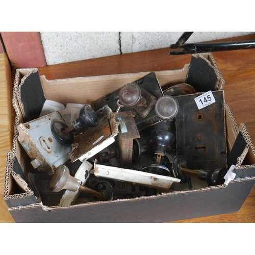 145 - BOX OF OLD DOOR HANDLES