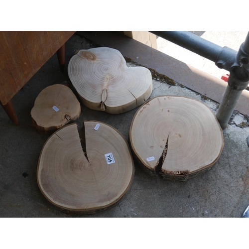 105 - 4 SMALL DISCS OF TIMBER