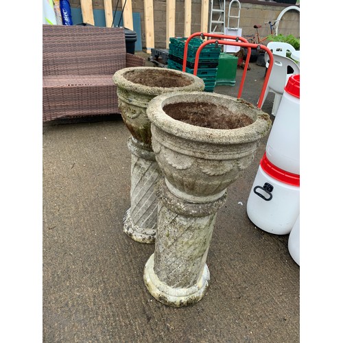 84 - PAIR OF CONCRETE PLANTERS