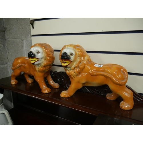 380 - PAIR OF STAFFORDSHIRE LIONS