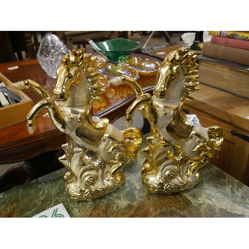 493 - PAIR OF HORSE ORNAMENTS