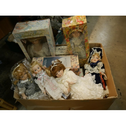 831 - BOX OF DOLLS