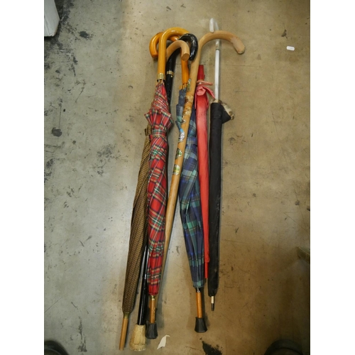 838 - LOT OF WALKING STICKS