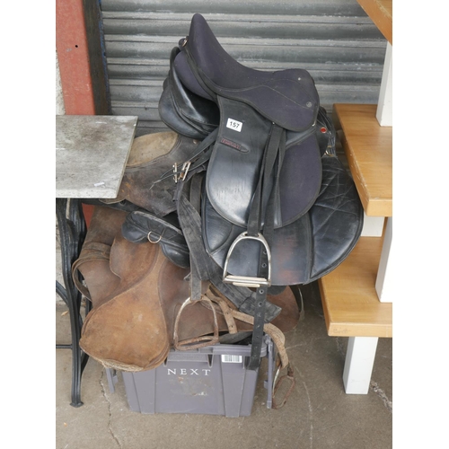 157 - LARGE LOT OF SADDLES